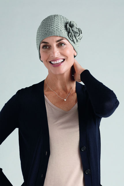 Smiling women wearing grey head cover